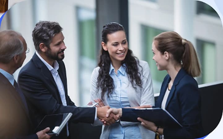 A candidate shaking hands on an offer
